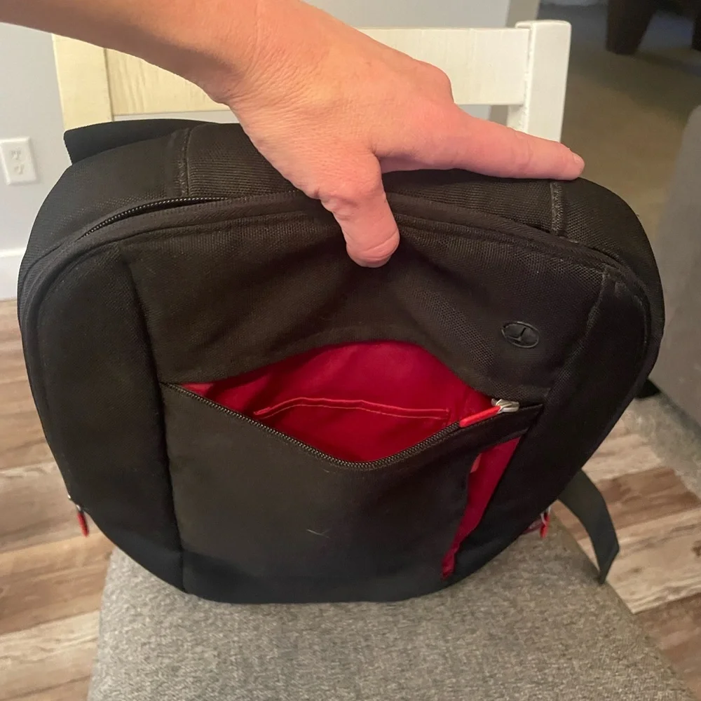 Belkin Black and Red laptop Backpack with crossbody carry strap